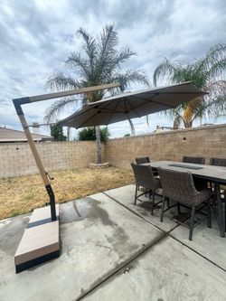 Patio umbrella with base