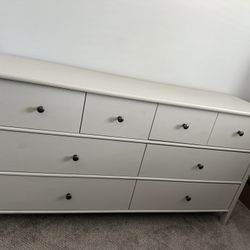 IKEA STOREMOLLA 8-drawer dresser in light grey-beige stained color.