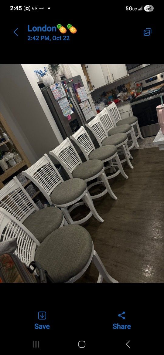 Eight countertop Swivel chairs.