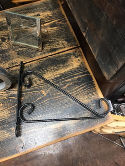 Plant hanger black iron. Heavy