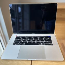 Macbook Pro 15” Touchbar i7 16Gb 256GB Microsoft Office 1 year Onsite Warranty 