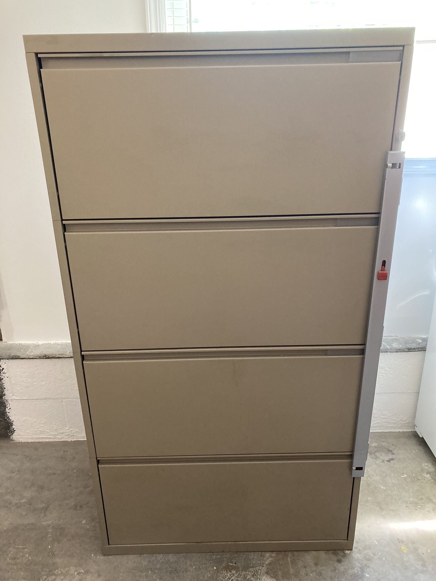 BRAND NEW 4 DRAWER FILE CABINET FOR SALE