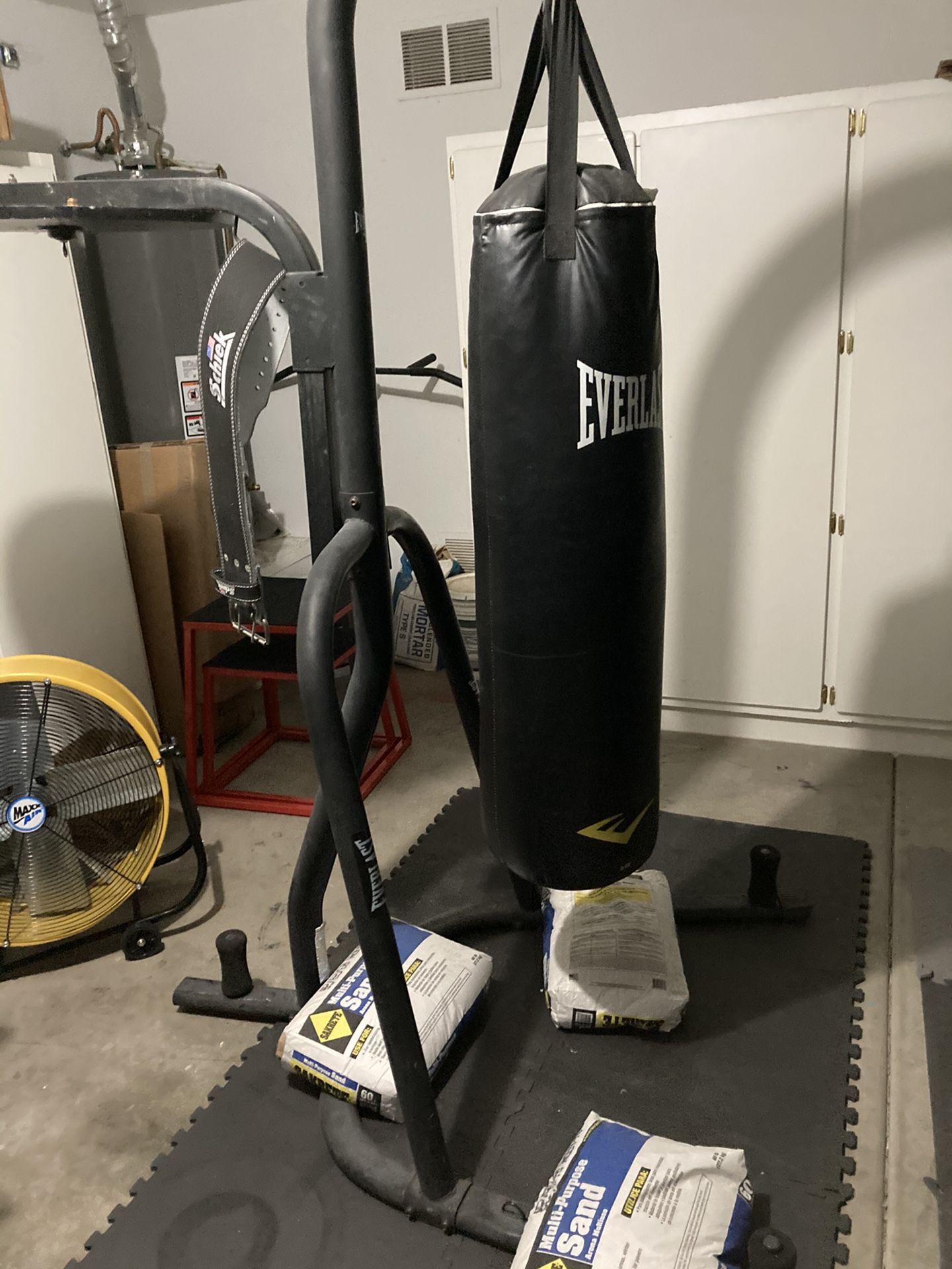 Heavy bag and speed bag stand