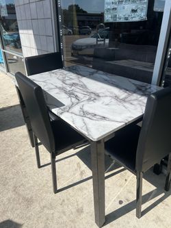 Furniture table with four chair