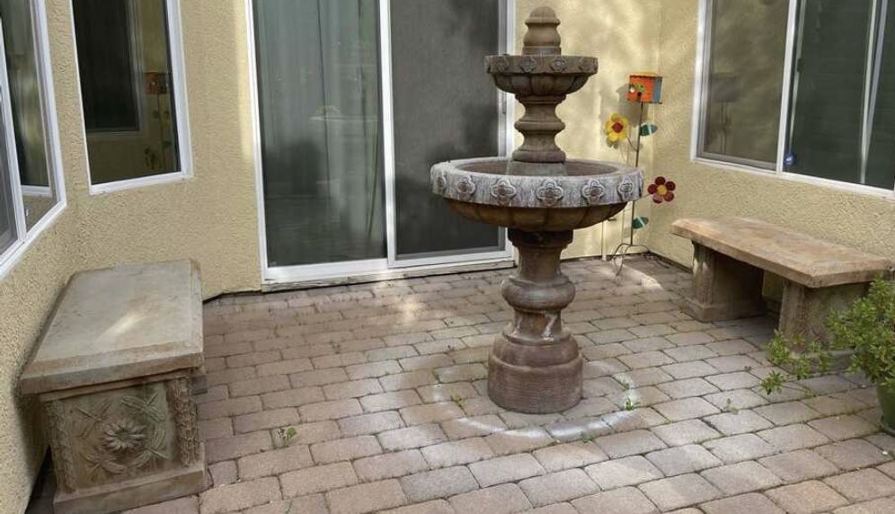 Garden concrete fountain and two benches with Dragonfly moti