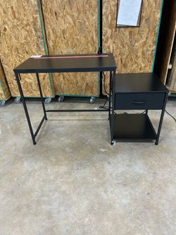 Black Desk with outlets & LED lights 48” long