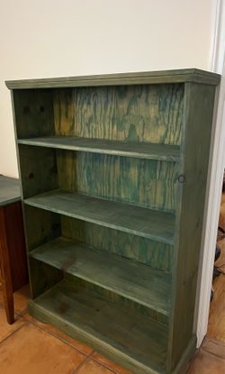 Beautiful customer made solid wood book case. Hunter green. Like new.