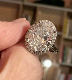 New 6 ct. oval brilliant lab diamond ring 14k wh/gld F color SI1. Very eye clean. Sz 7