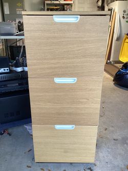 IKEA GALANT filing cabinet in white stained oak veneer with distinct white drawer handles.
