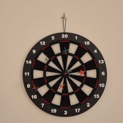 Dart board with Darts