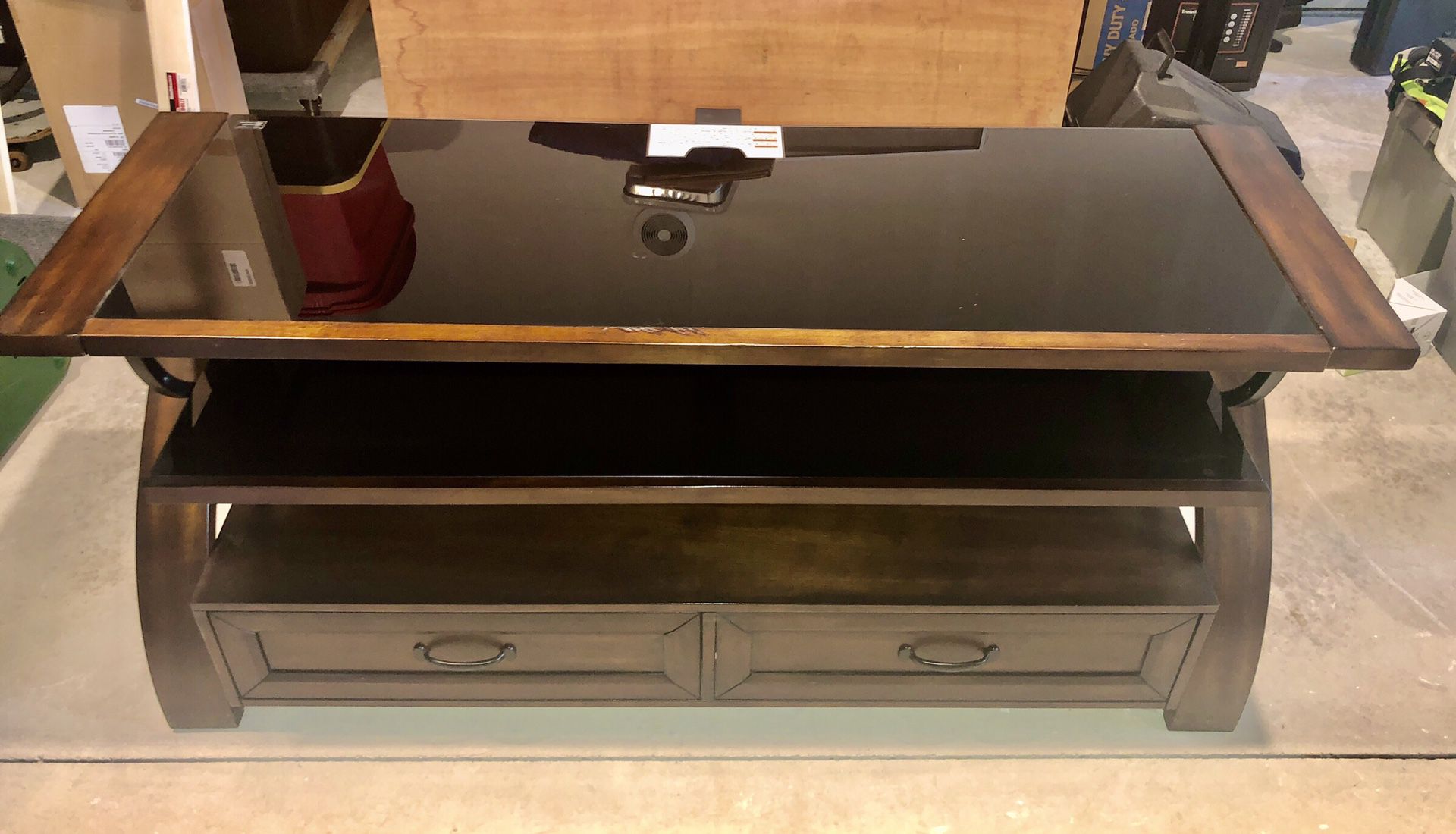TV stand in good condition 56 in wide x 18 in deep x 24 in high with 2 drawers