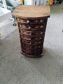 Small table top chest 8 drawers 17" H  8" W. 7" pickup only cash
