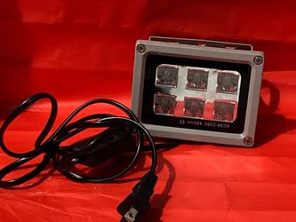 Extra parts of a 3D printer and a UV light for curing