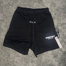 *Never Worn* Fear of God Essential shorts  black. Size M 