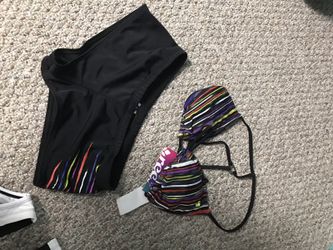 Brand new Reef bathing suit. Size medium but seems to be on the smaller size.