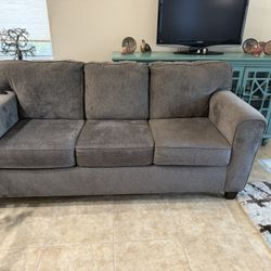 Gently Used Medium Gray Sofa. 