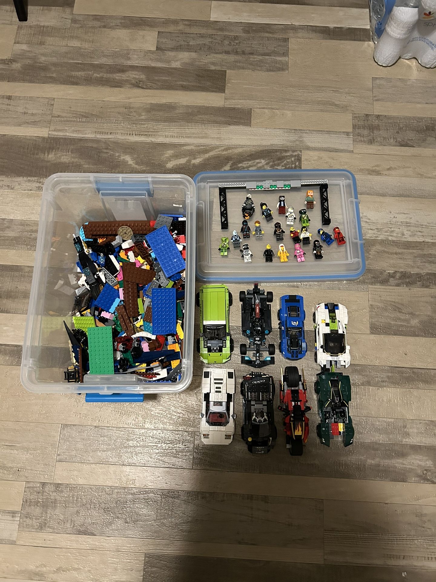 Box Of Legos Including Cars Etc