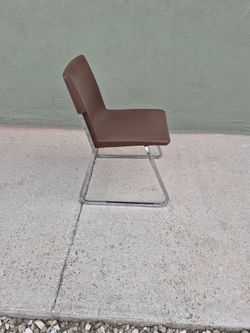 Stackable plastic chairs