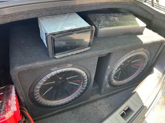2 12inch subwoofers, deck, and amp