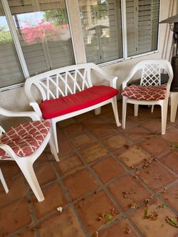 Plastic loveseat and chairs