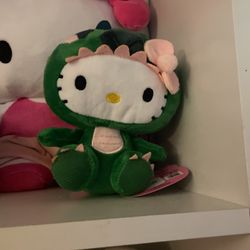 Hello kitty dinosaur plushy 