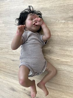 Realistic baby doll