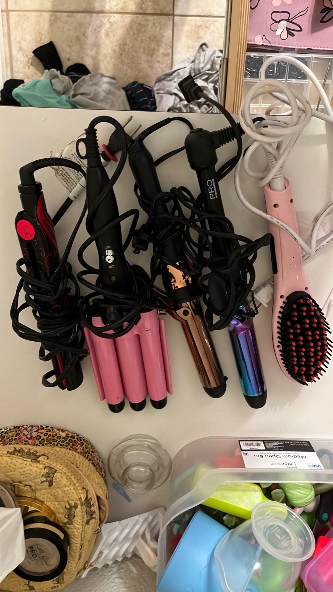 Hair curlers and straighteners