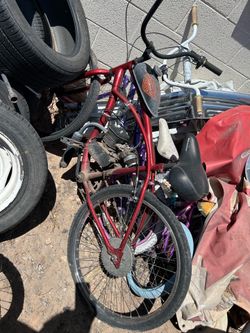 a customized red motorized beach cruiser bicycle