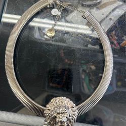 vintage 1970s/80s Chucky Omega silver-tone metal lion head statement choker necklace.  