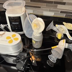 Medela Breast pump & bottle warmer