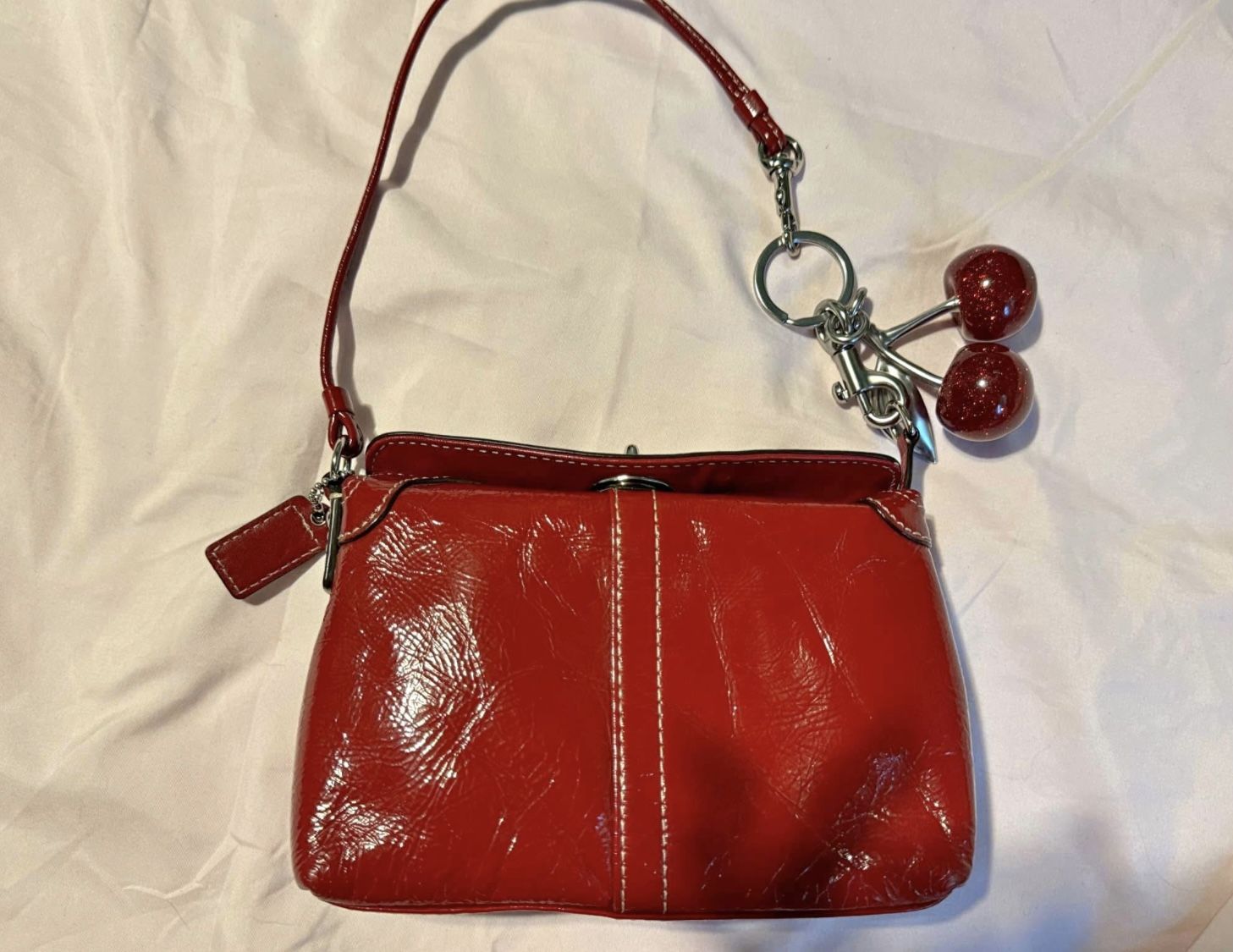 Coach Turnlock Mini Wristlet Bag 