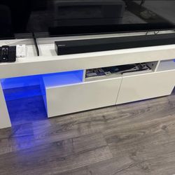TV STAND in White W/ LED’s 💙💜