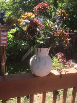 I have 2 of these beautiful floral decor in Sturdy cement pot