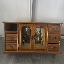 Wooden glass paneled jewelry box with mirror
