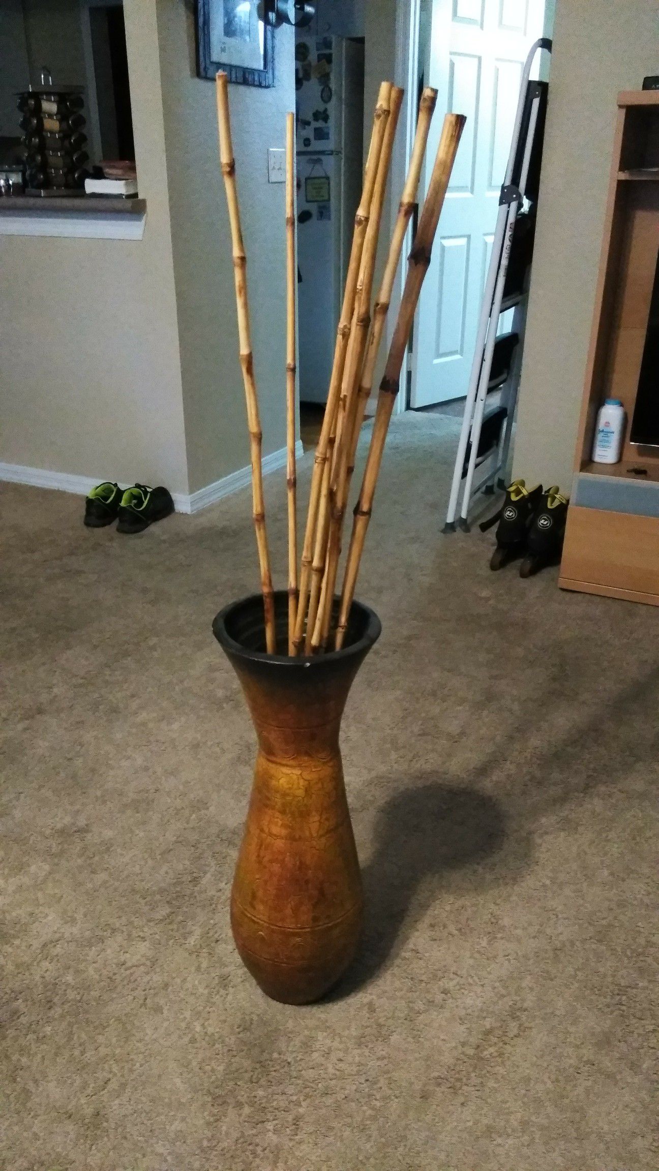 Decorative done base with bamboo sticks