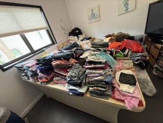 Lots of girls clothes from 5-14 years old.