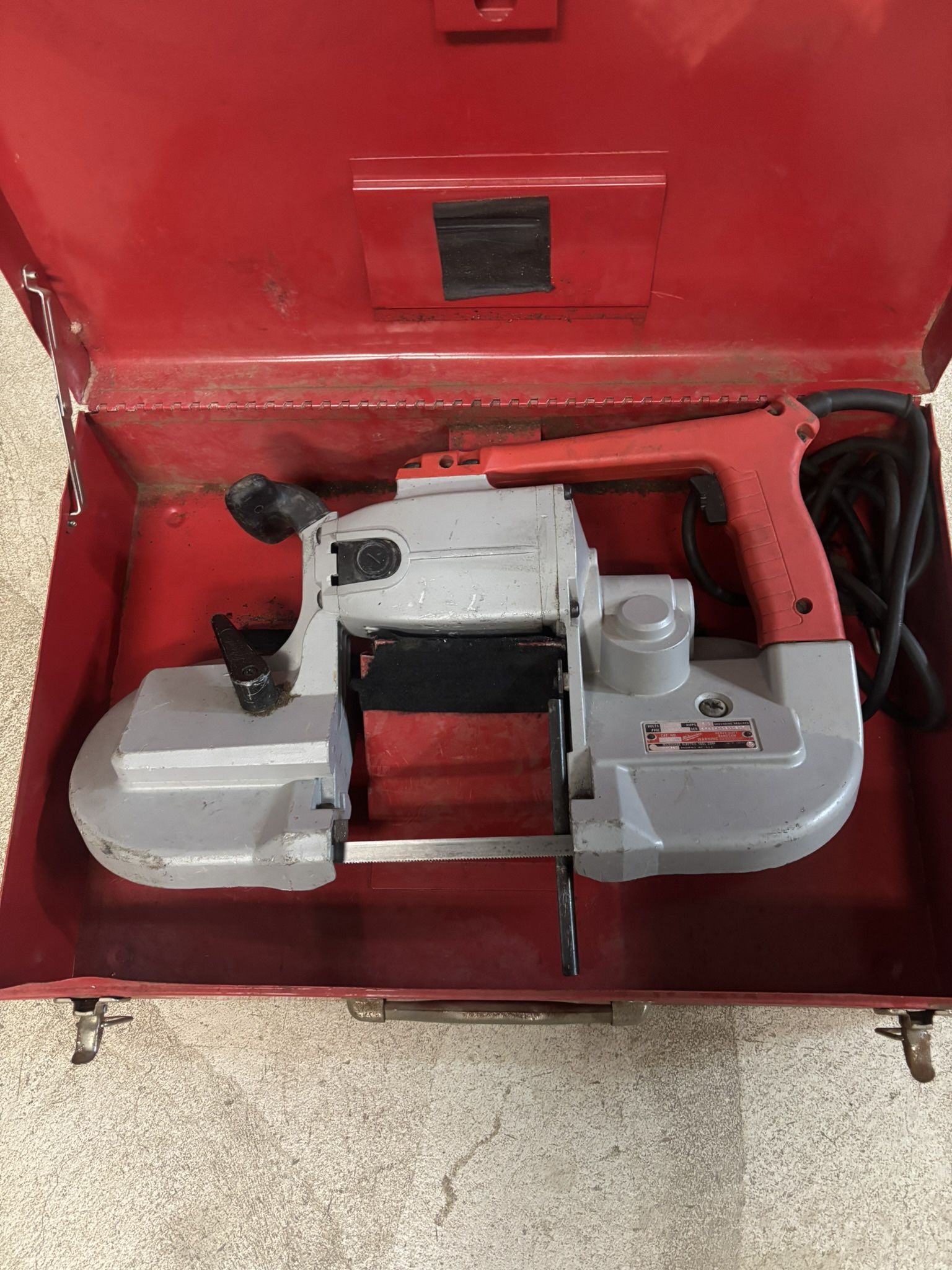 Milwaukee bandsaw with metal case