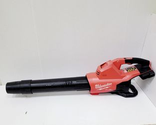 Milwaukee M18 FUEL cordless blower has a red and black plastic body. This handheld tool is part of the M18 battery system and requires two batteries f