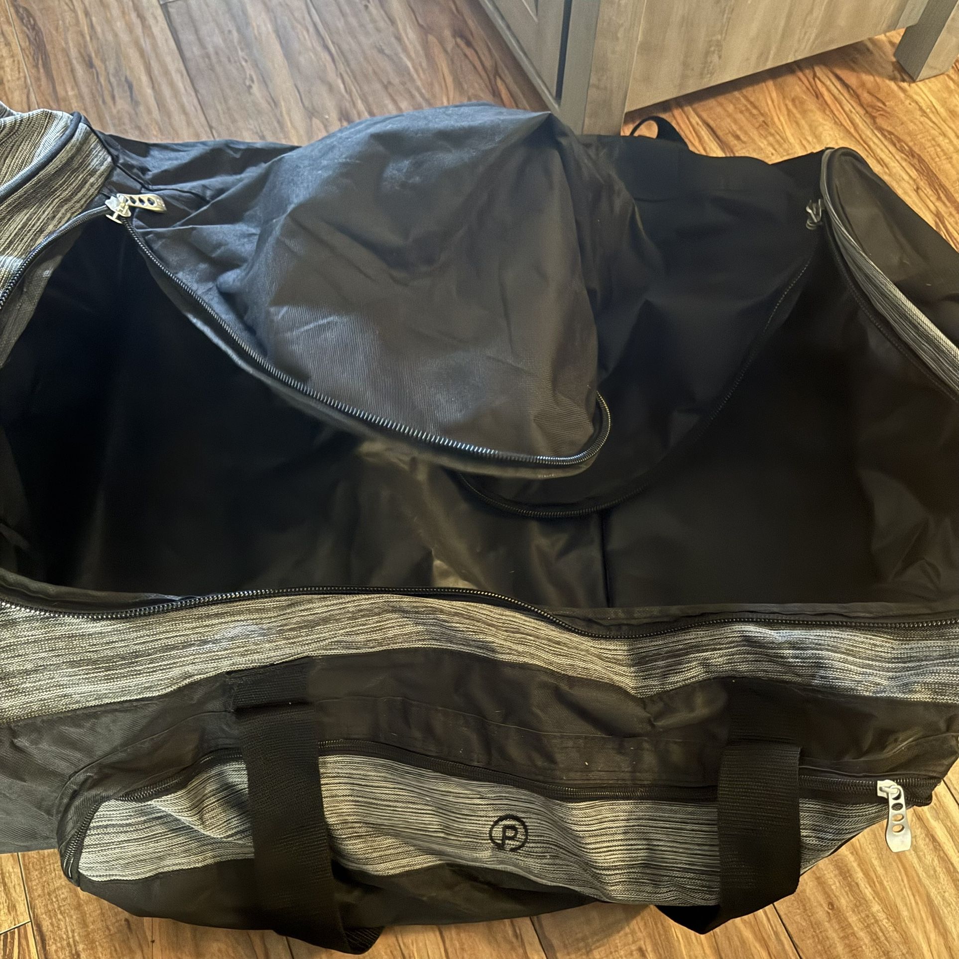 Protege 24" Rolling Duffle Bag Massive Luggage Bag Black Gray Pull Handle Soft
