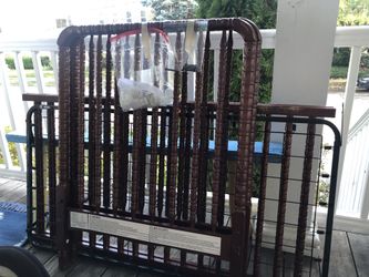 Baby crib with hardware.