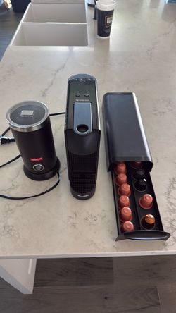 Nespresso machine w storage and frother