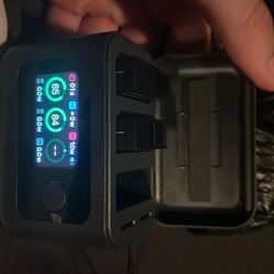 Osmo camera batteries and Battery charger. 