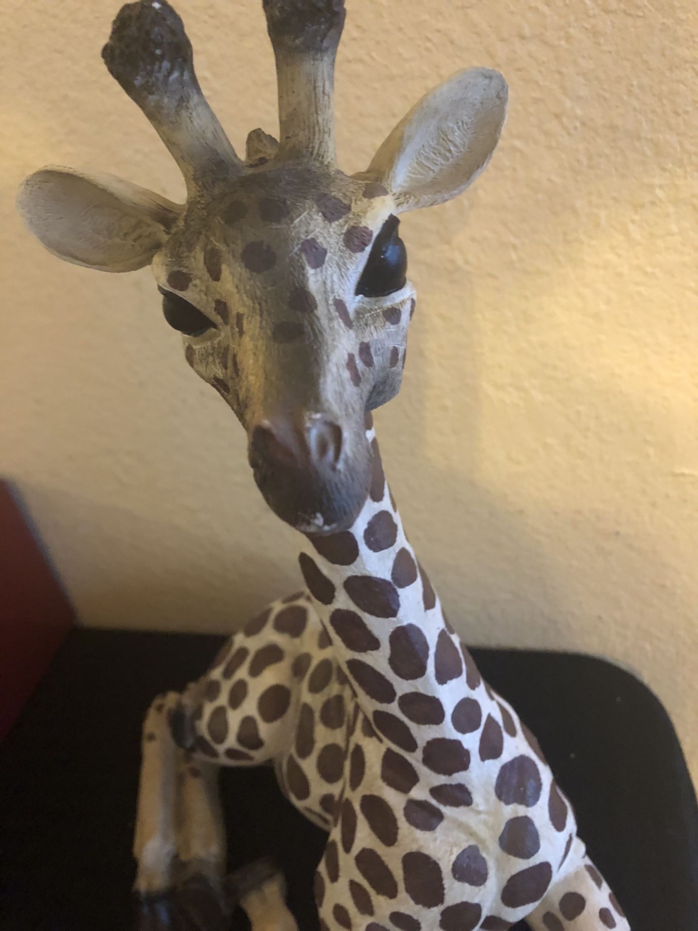 Very cool sitting giraffe 14” high $20