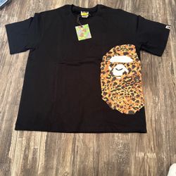 BAPE black t-shirt with leopard print ape head