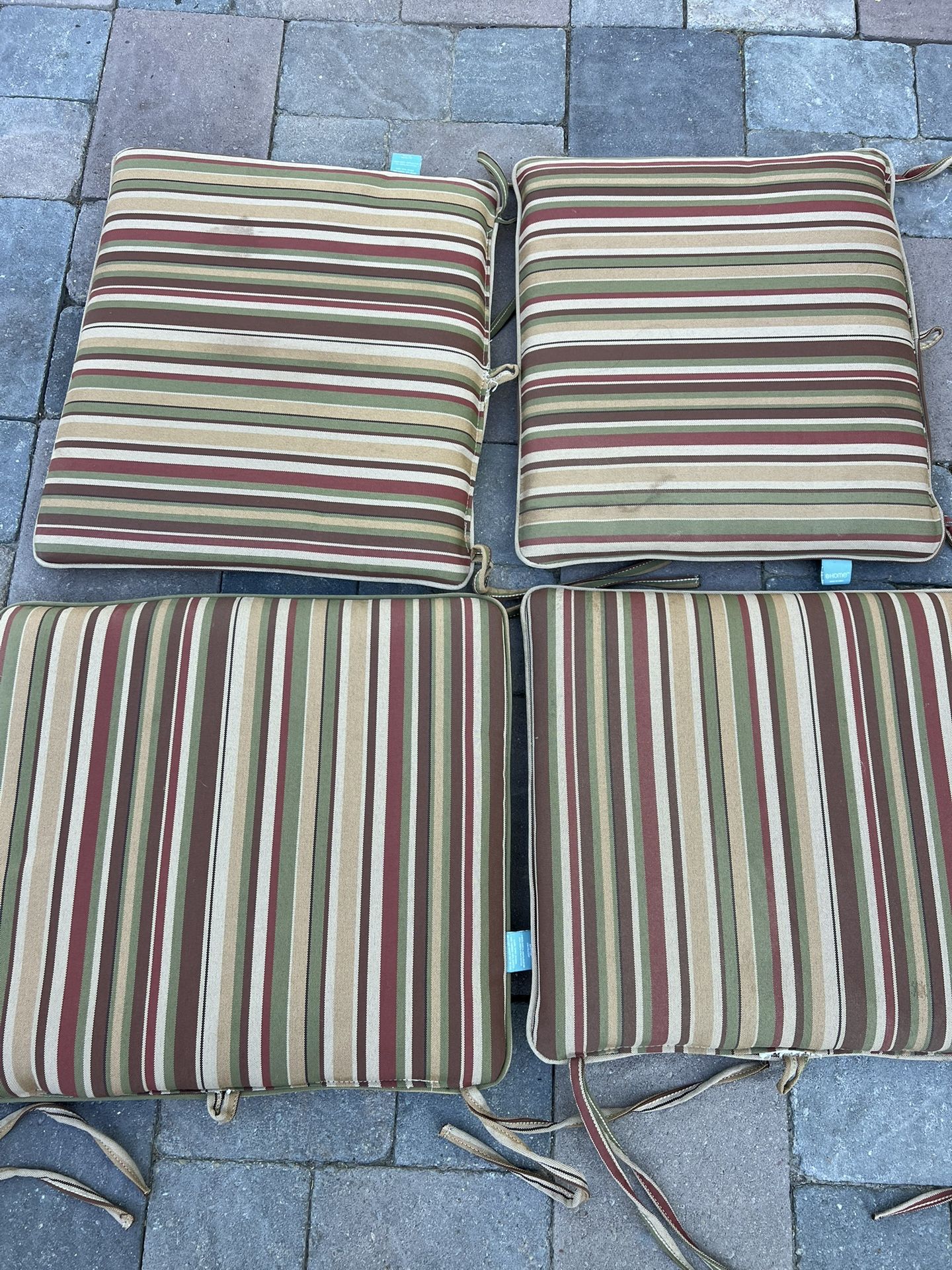4 Piece Outdoor Patio Furniture Cushions in Multi-Color Stripes Located in concord Very good condition No damages Covers not removable Measures