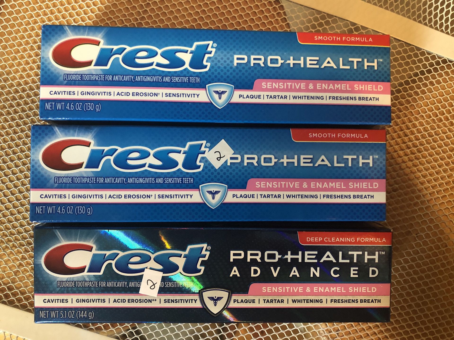 3 Crest toothpastes