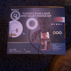 Light And Phone Holder