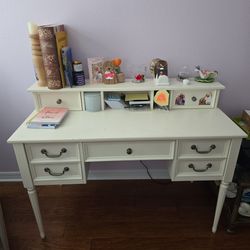 Pottery Barn desk with light pink fluffy chair