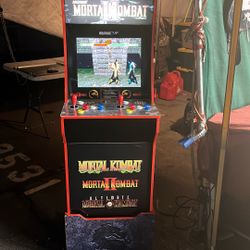 Arcade.   Mortal Kombat.  $290.  Firm 