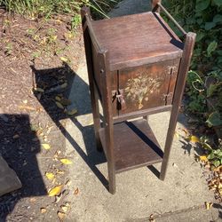 Humidor from 1920s all wood  inside the box has shelf fine antique sturdy solid the stencil or art work is fading because of age 9x9-27 Tall low profi